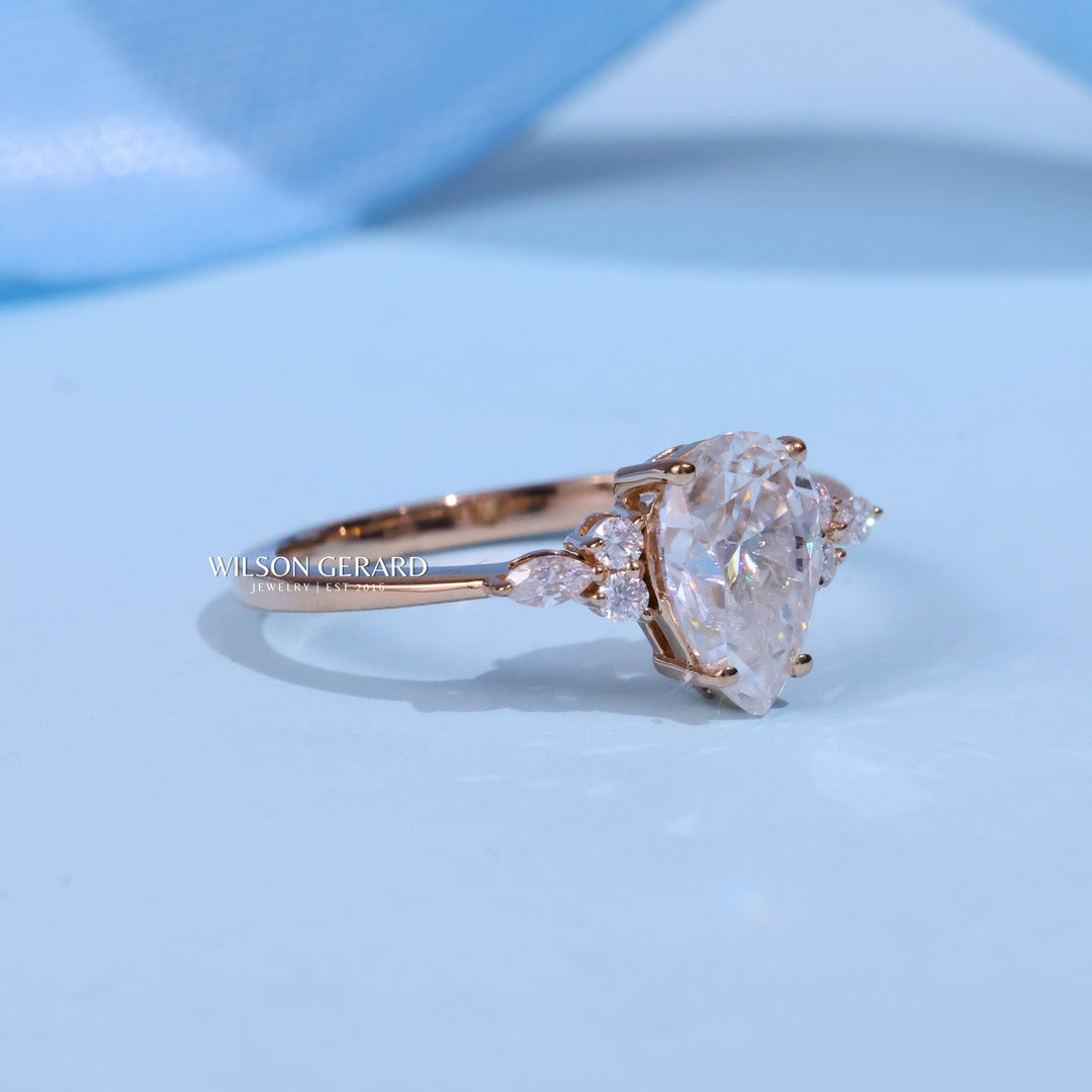 1.0CT Pear E/VS Lab Grown Diamond Cluster Engagement Ring
