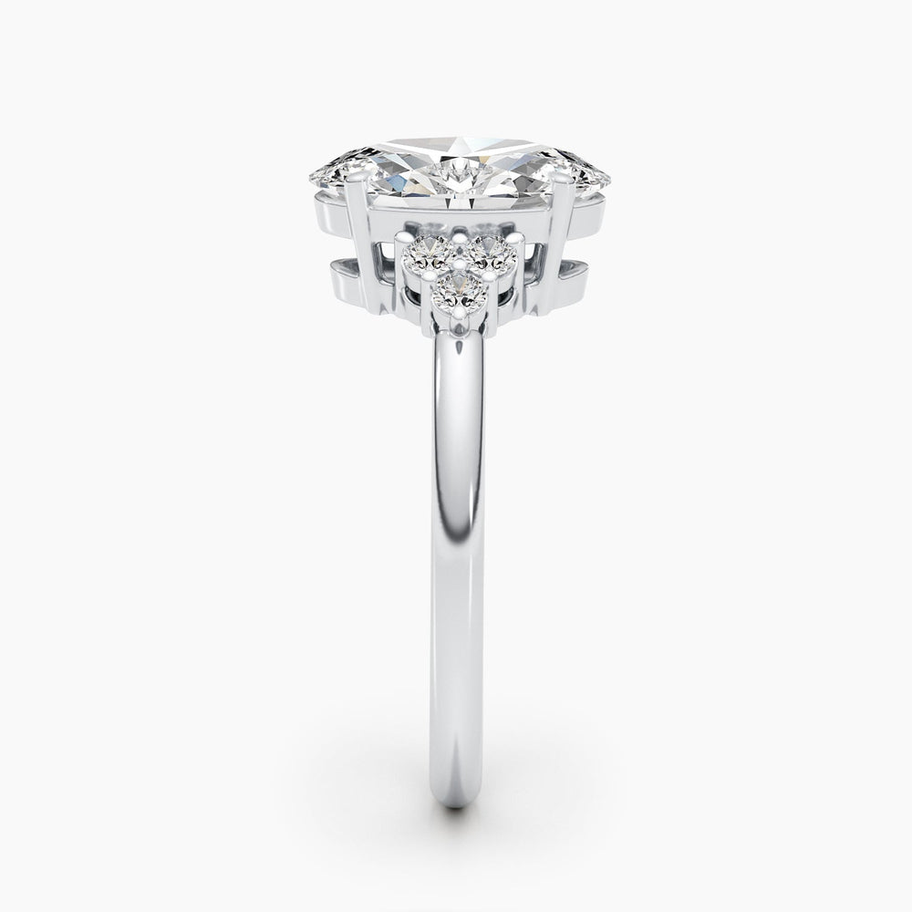 oval-shaped-g-vs-diamond-engagement-ring-with-pave-setting