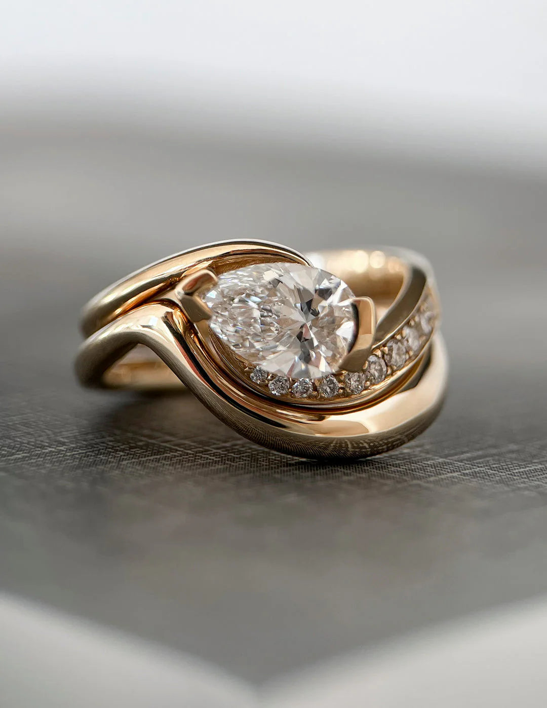 Pear East West Lab Grown Tension Style Pavé Engagement Ring With Matching Curved Band