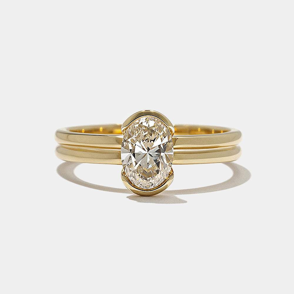 oval lab grown diamond half bezel engagement ring 0.75 carat E VS1