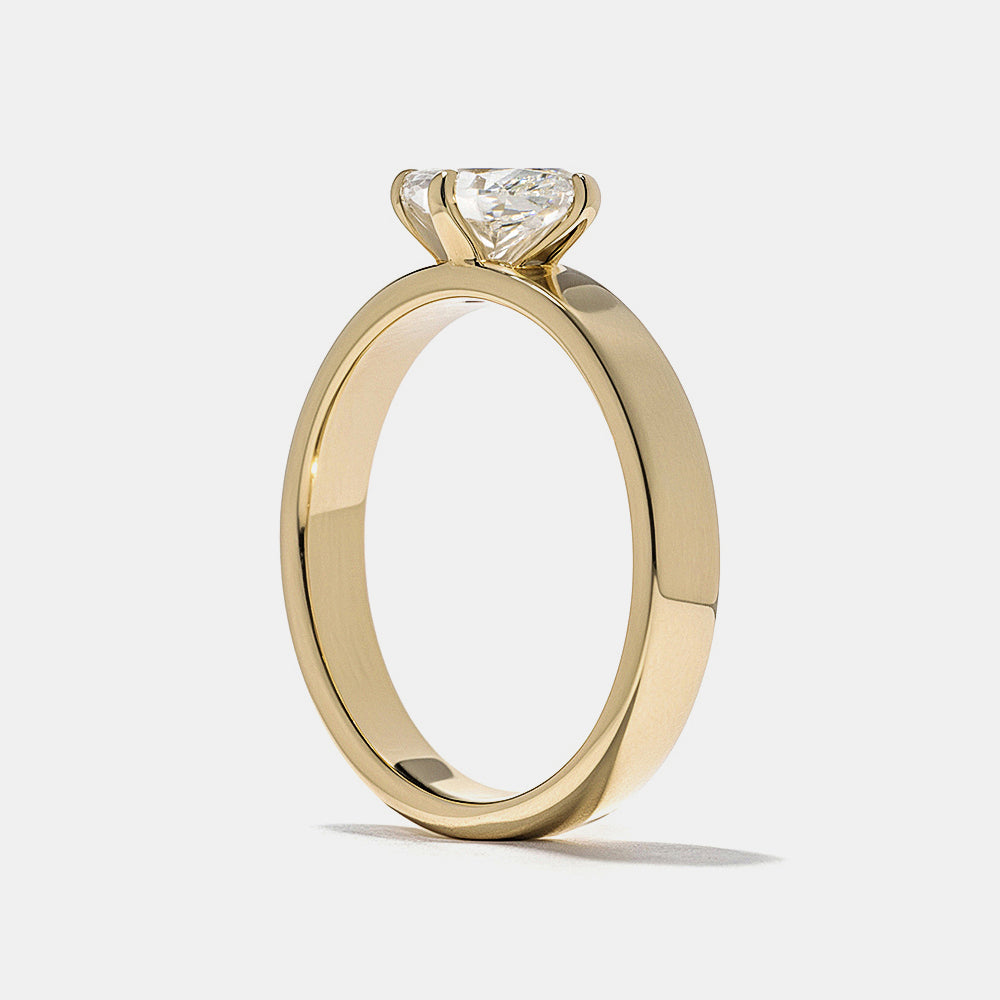 0.75 carat east west marquise E VS1 lab grown diamond cigar band solitaire engagement ring in minimalist bold wide band design