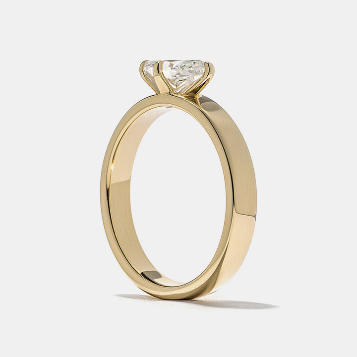 0.75 carat east west marquise E VS1 lab grown diamond cigar band solitaire engagement ring in minimalist bold wide band design