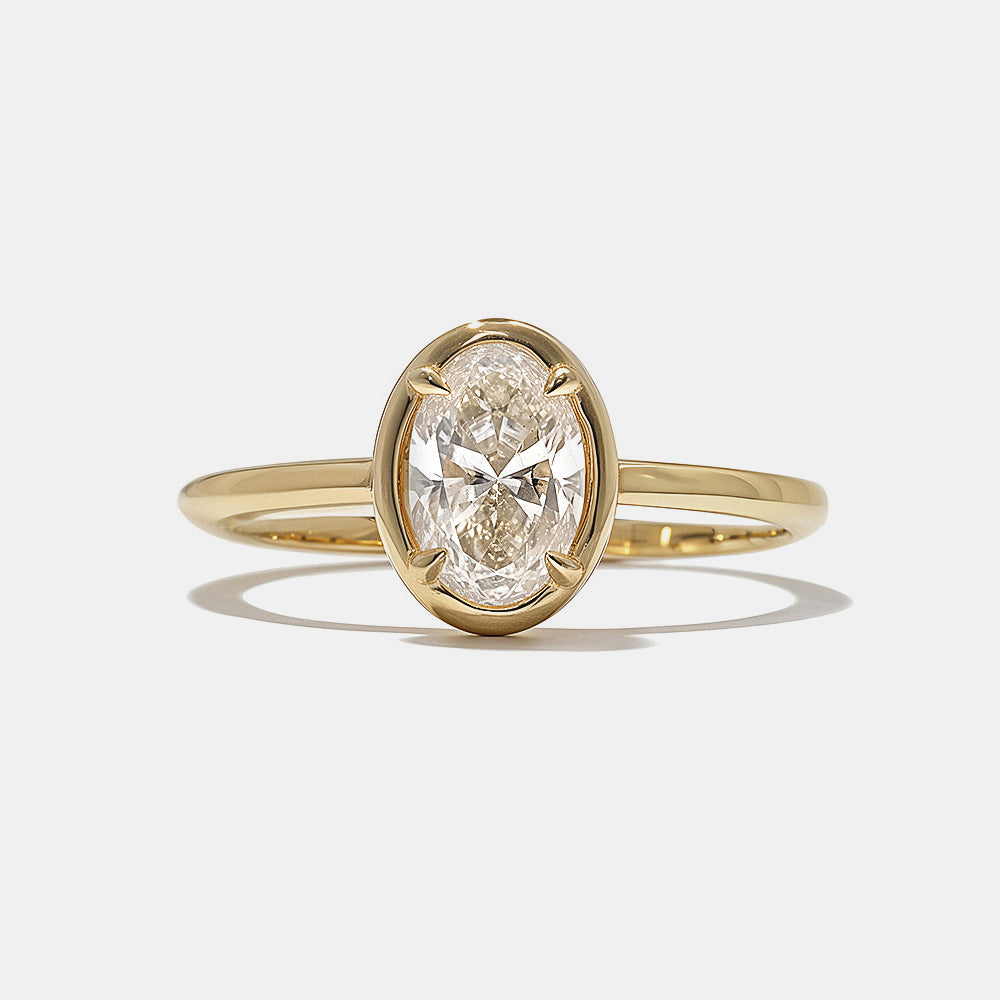 oval lab grown diamond bezel engagement ring 0.75 carat E VS