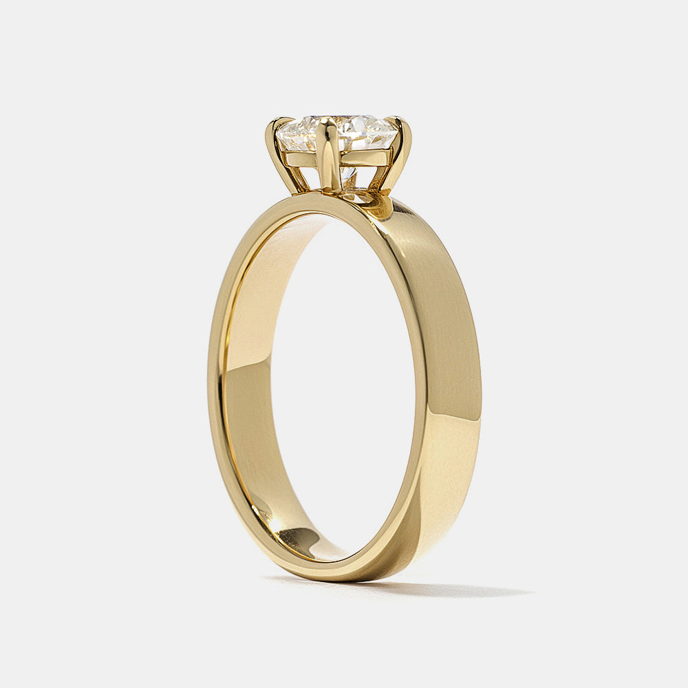 0.75 carat round E VS1 lab grown diamond cigar band solitaire engagement ring in bold minimalist wide band design