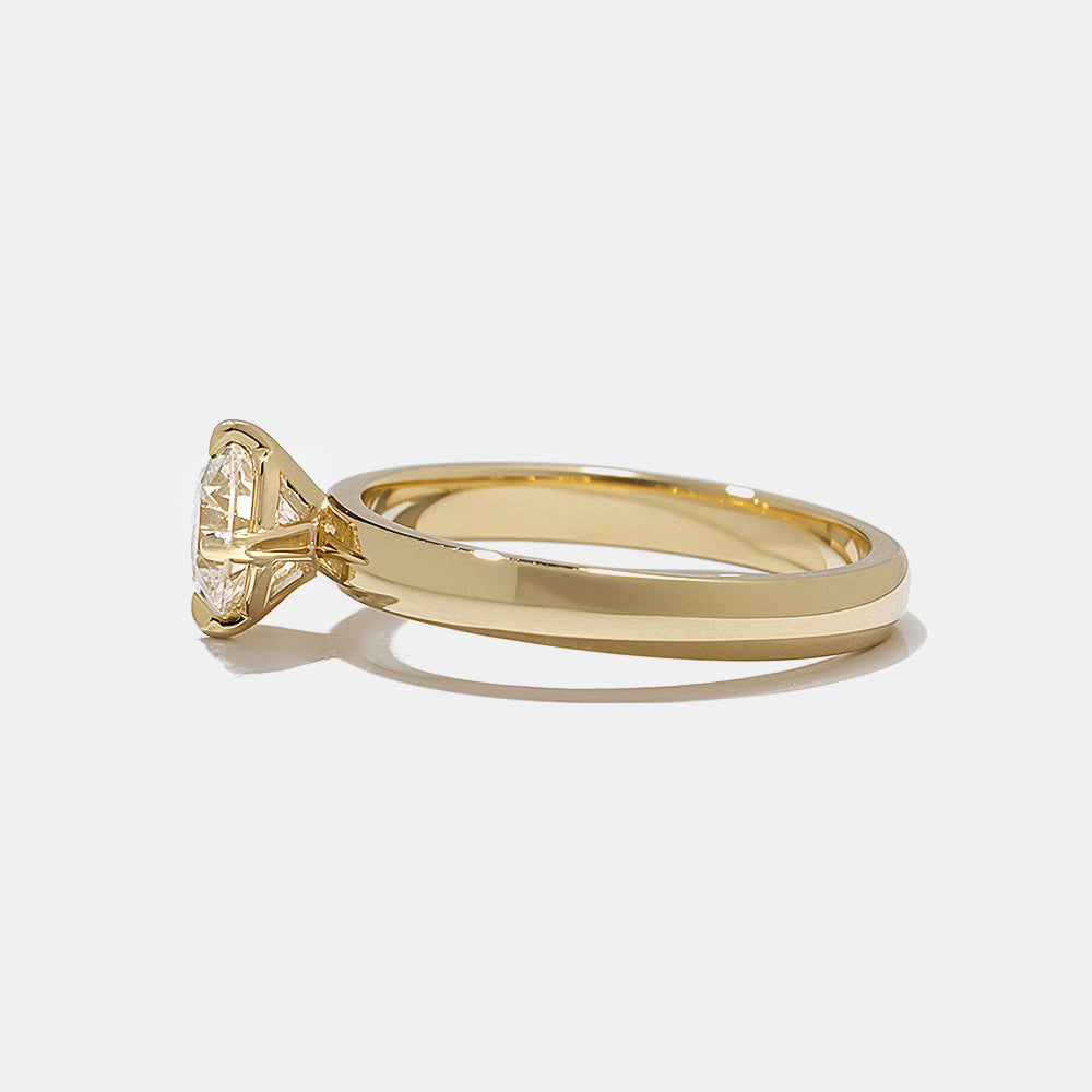 0.75 carat round CVD lab grown diamond cigar band solitaire engagement ring set in polished gold minimalist modern design