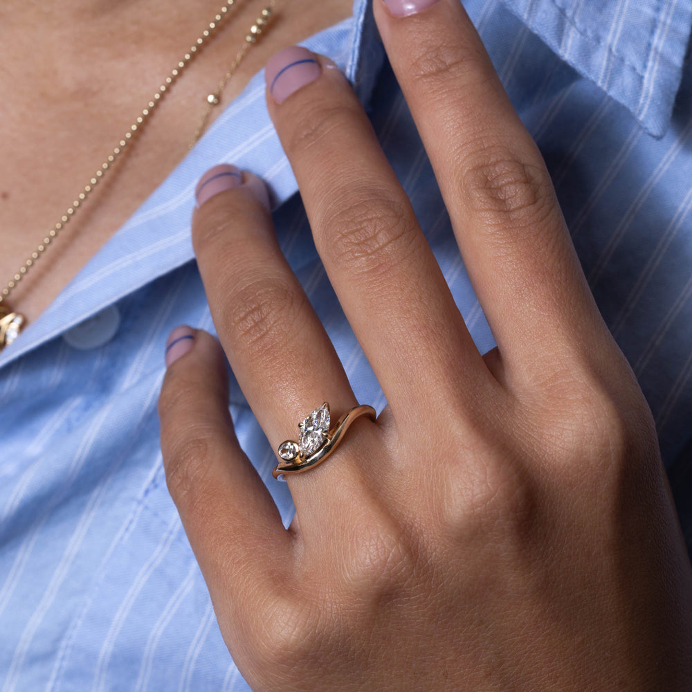 Professional jewelry photography of 0.7 carat marquise and oval lab grown diamond bezel Toi Et Moi engagement ring