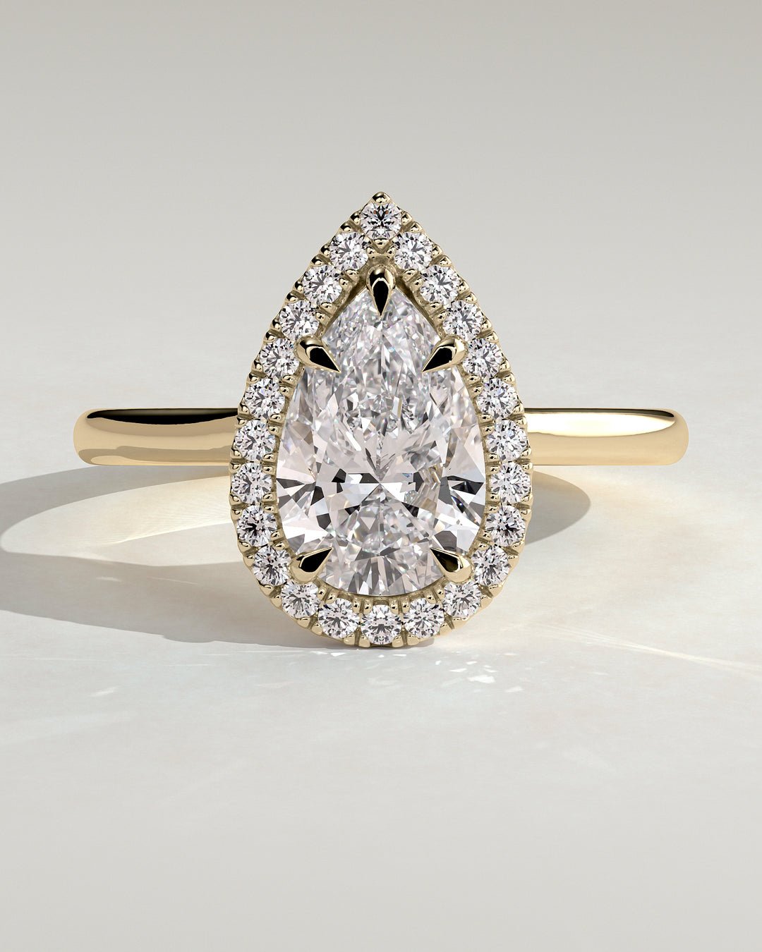 1.0ct Pear Halo Solitaire Cathedral Set Engagement Ring