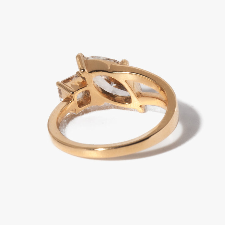 1.3 carat marquise and Asscher cut lab diamond Toi Et Moi engagement ring set in polished gold modern design