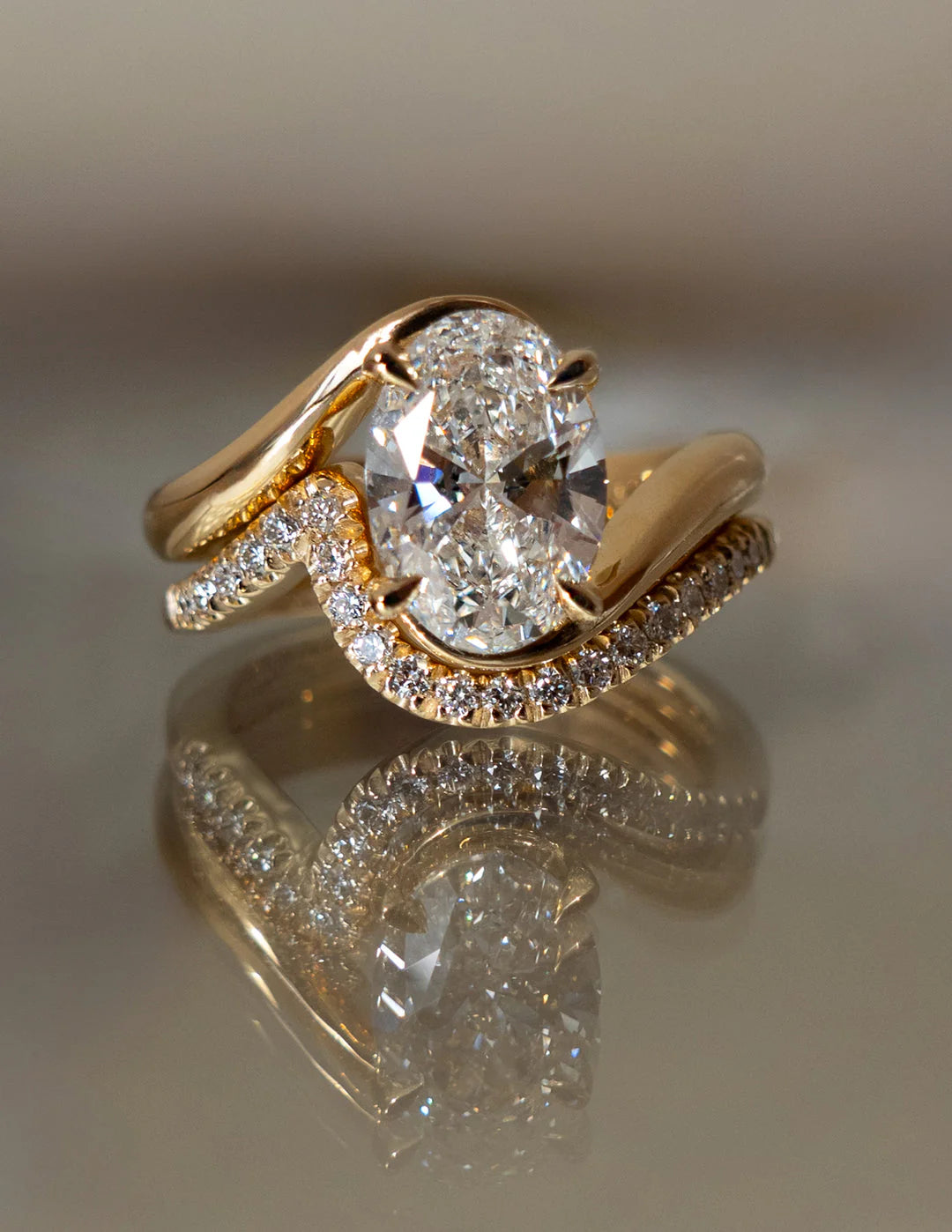 Oval Lab Grown Diamond Tension Style Engagement Ring With Matching Band