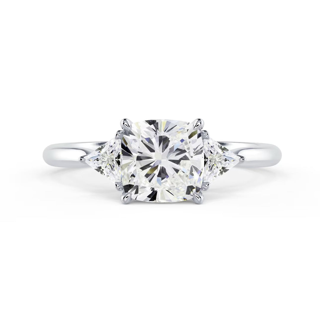 Front view of 1.50CT cushion cut lab grown diamond three stone engagement ring E VS2 showing brilliance and symmetry