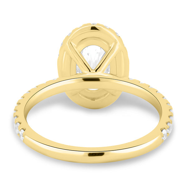 1.50 carat oval lab grown diamond halo pavé engagement ring crafted in polished gold with refined appeal