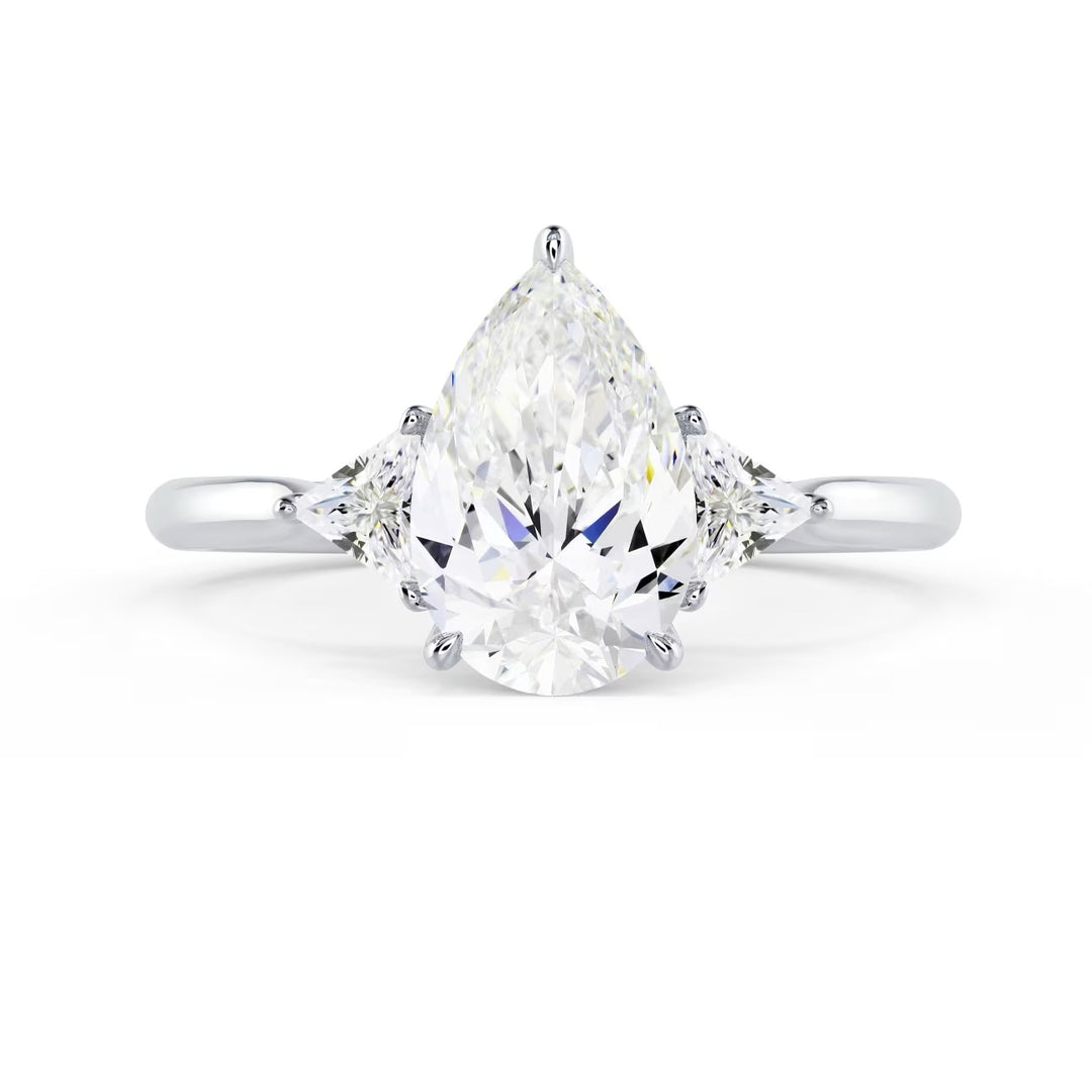 1.5 carat pear cut lab grown diamond three stone engagement ring