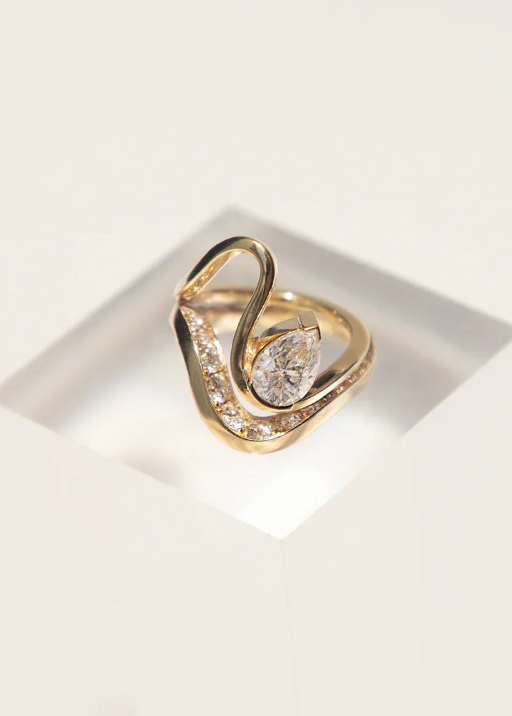 Pear Floating Lab Grown Diamond Engagement Ring With Matching Wedding Band