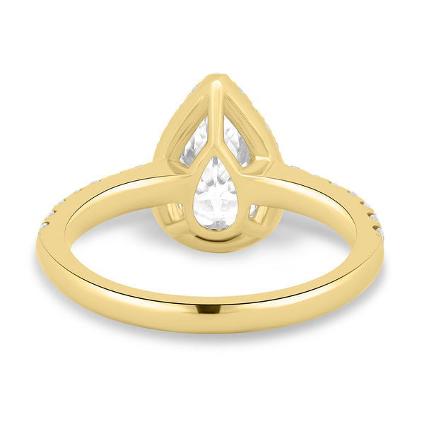 1.5 carat pear lab grown diamond halo pavé engagement ring set in polished gold modern bridal design