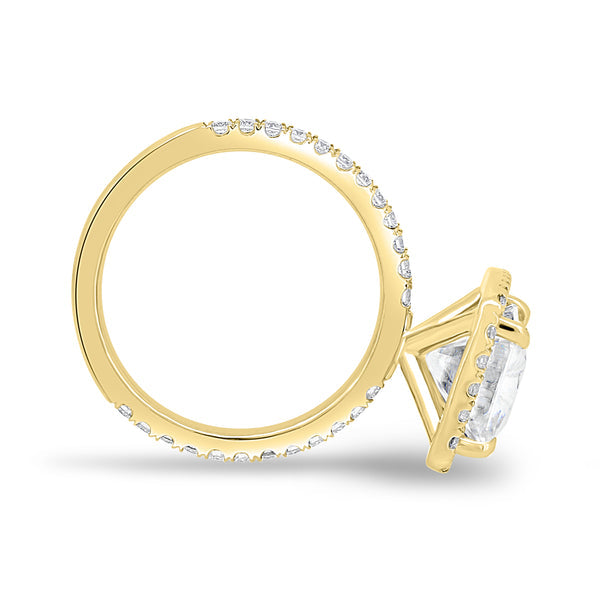 1.5 carat radiant lab grown diamond halo pavé engagement ring set in polished gold modern bridal design