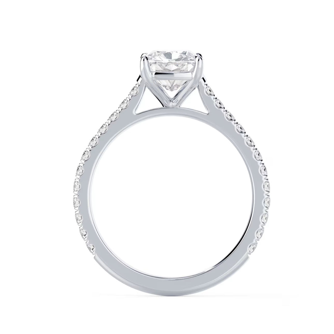 1.5 carat cushion cut lab grown diamond cathedral pave engagement ring set in white gold with refined pavé sparkle