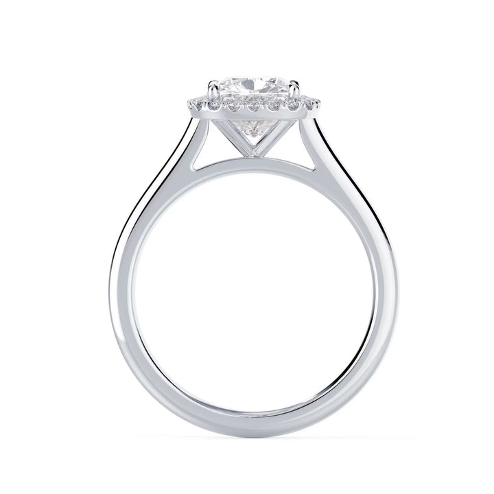 1.5 carat cushion cut lab grown diamond halo solitaire engagement ring set in white gold with soft brilliance