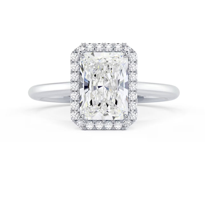 1.5 carat radiant cut lab grown diamond halo solitaire engagement ring set in white gold with strong geometric sparkle