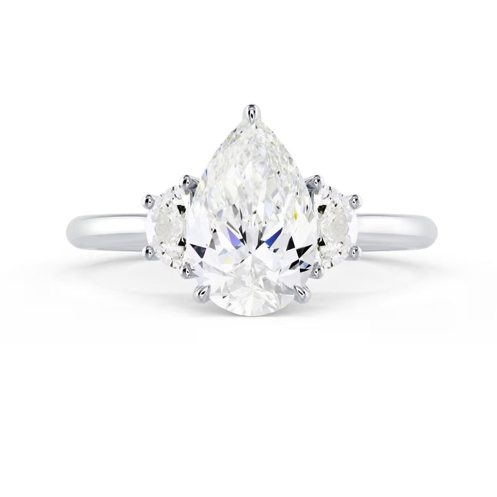 pear lab grown diamond three stone solitaire engagement ring