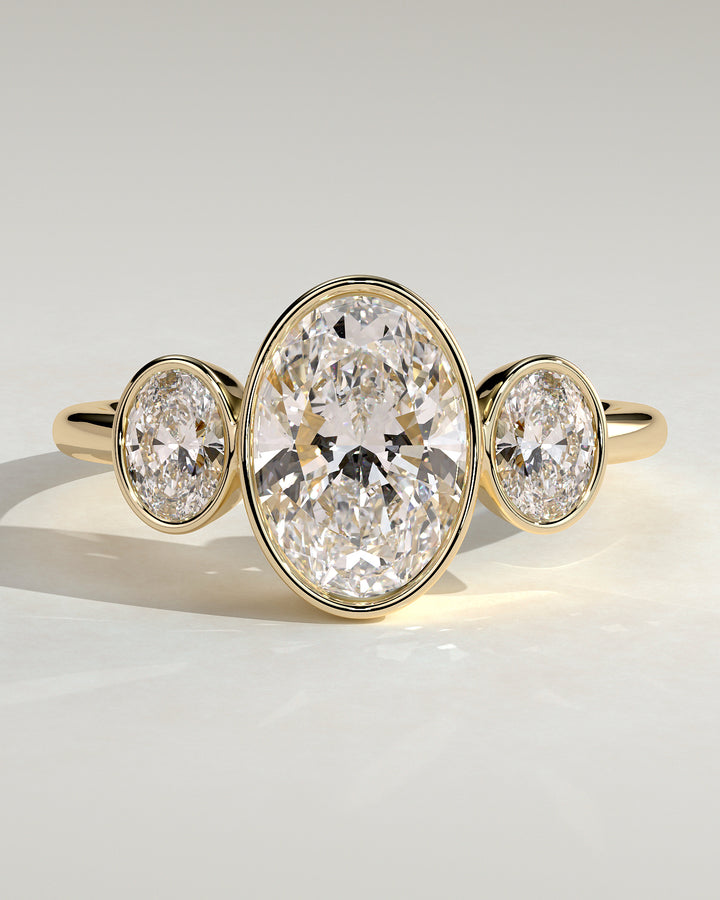 1.5ctOvalBezelTrilogyEngagementRing