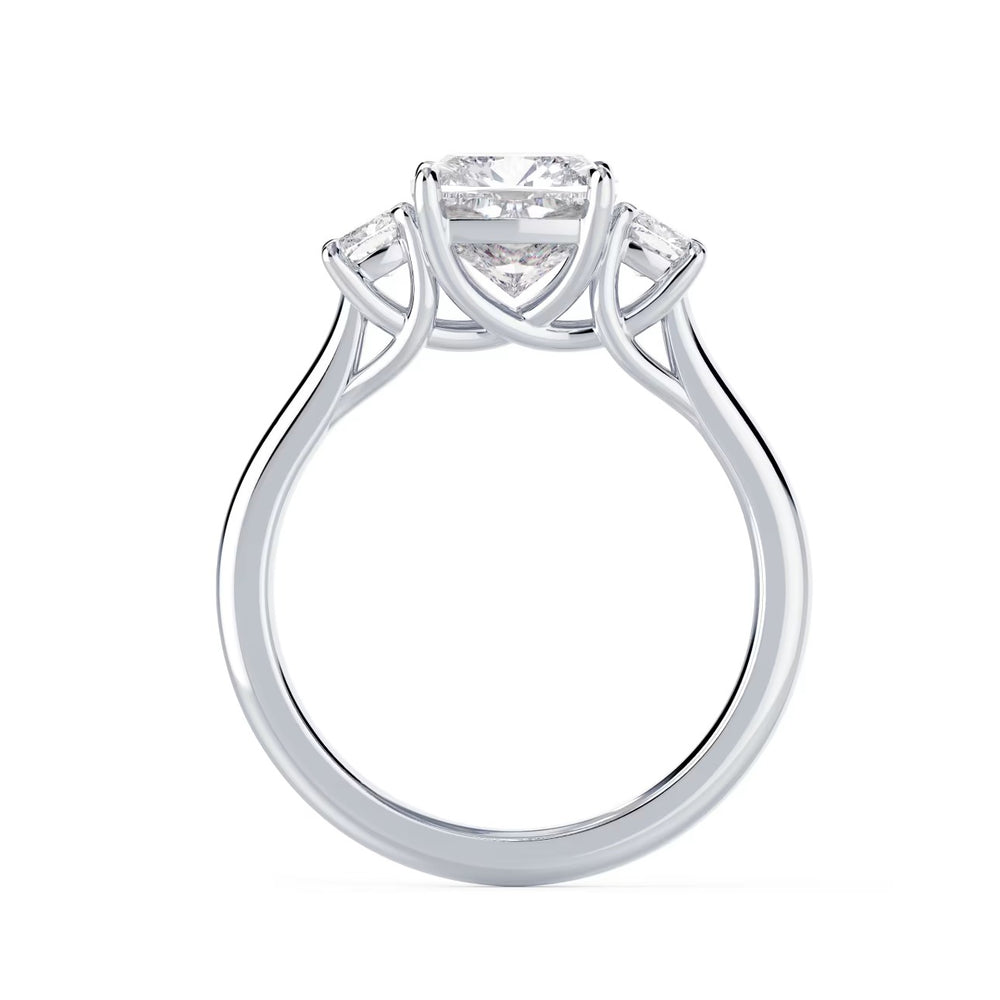 cushion cut three stone engagement ring with side stones E VS1