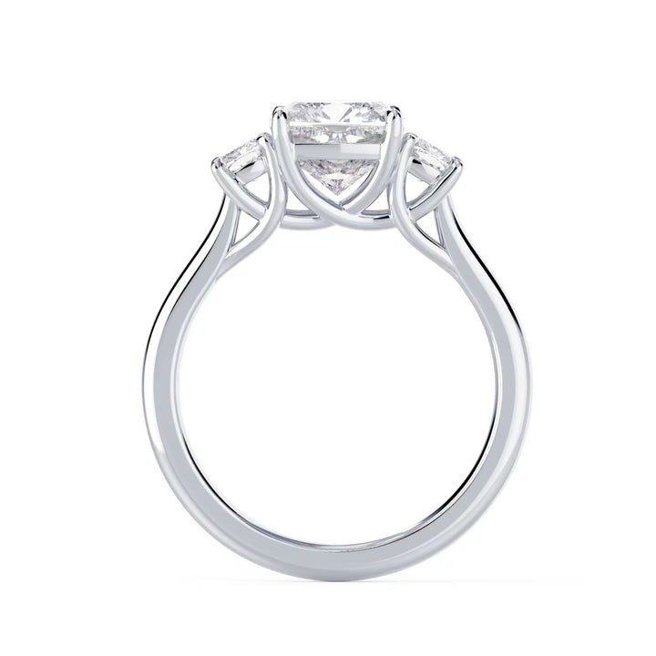 cushion cut three stone engagement ring with side stones E VS1