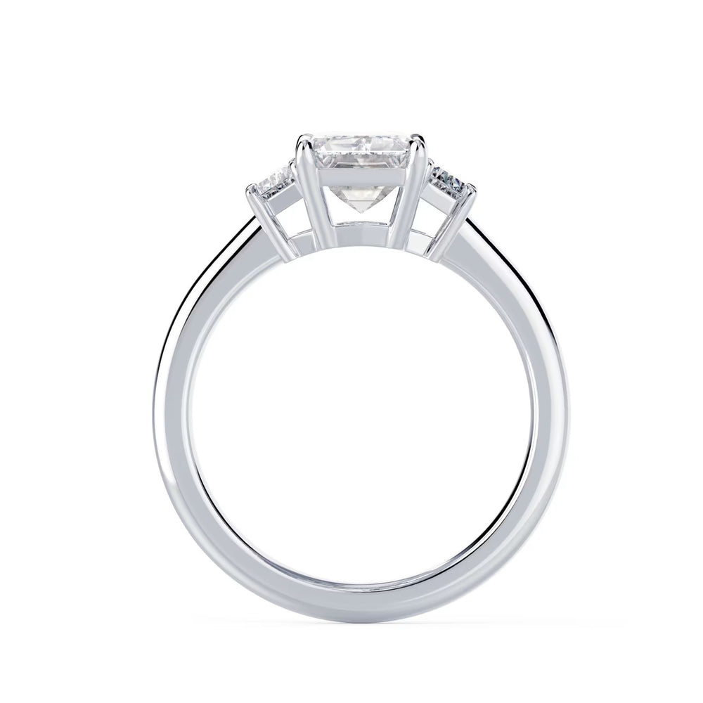 1.5 carat emerald diamond three stone ring timeless bridal style