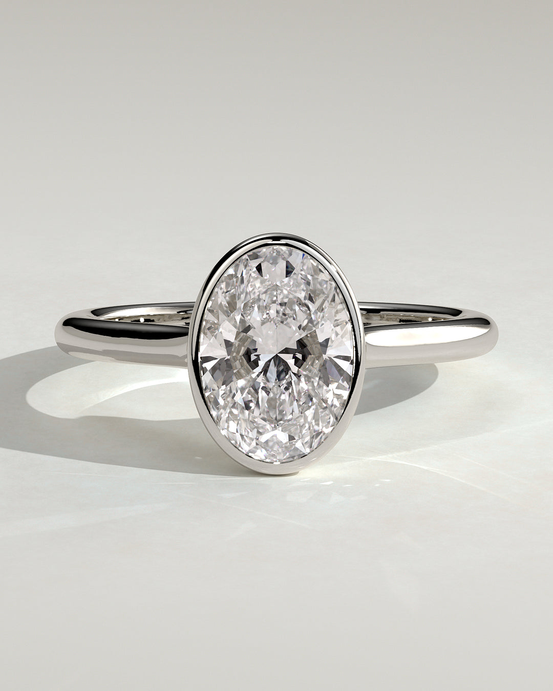 1.5ct Oval Bezel Solitaire Engagement Ring 950 Platinum Twisted Gallery