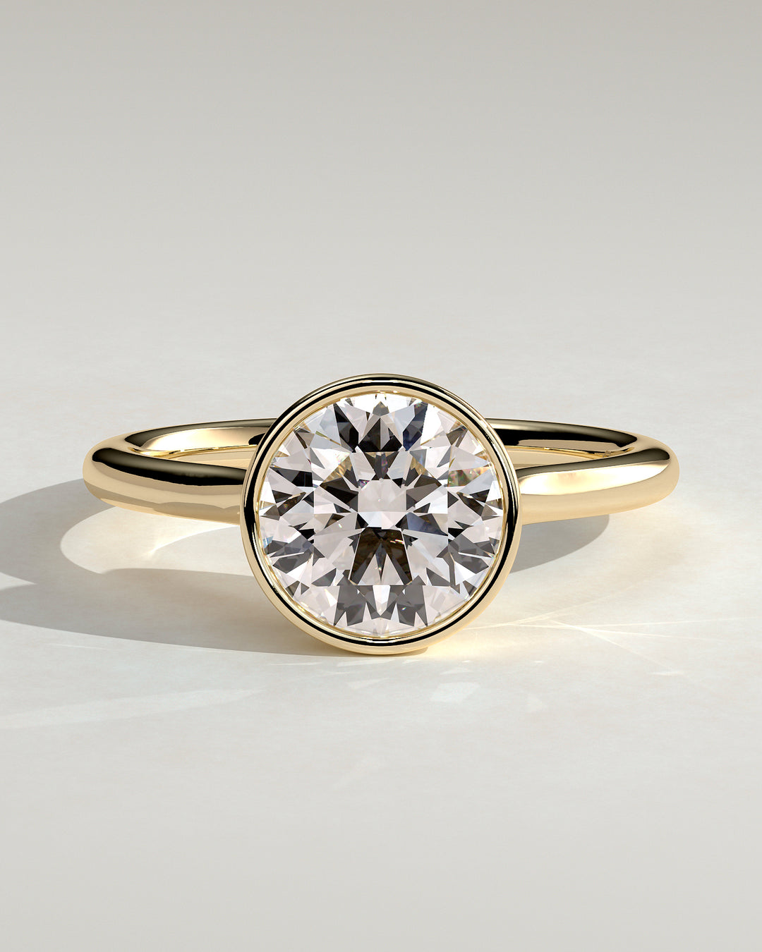 1.5ct Round Bezel Solitaire Twisted Gallery Engagement Ring