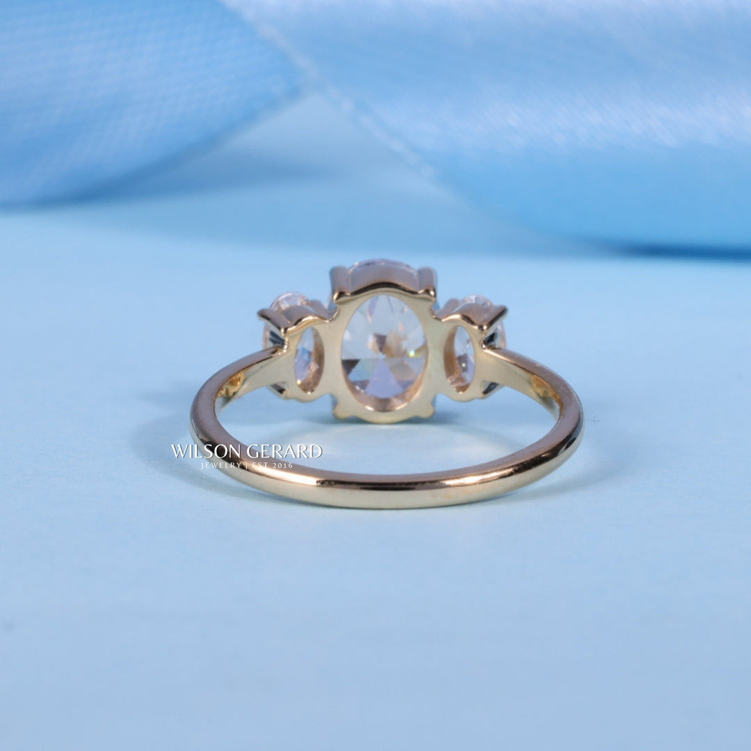 1.0CT Oval E/VS1 Lab Grown Diamond Three Stone Engagement Rings