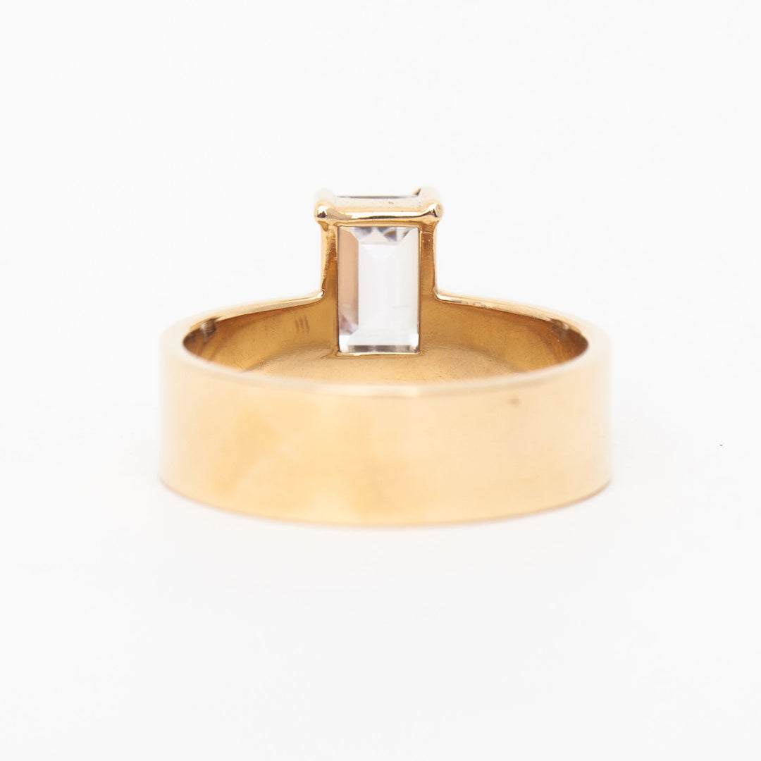 1 carat emerald lab diamond monolith engagement ring set in polished gold minimalist modern design