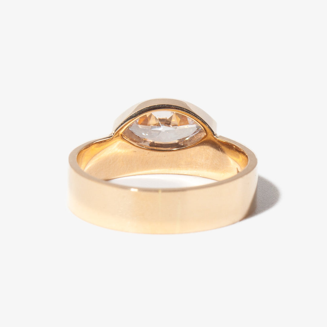 1 carat east west marquise lab diamond monolith engagement ring set in polished gold minimalist modern design