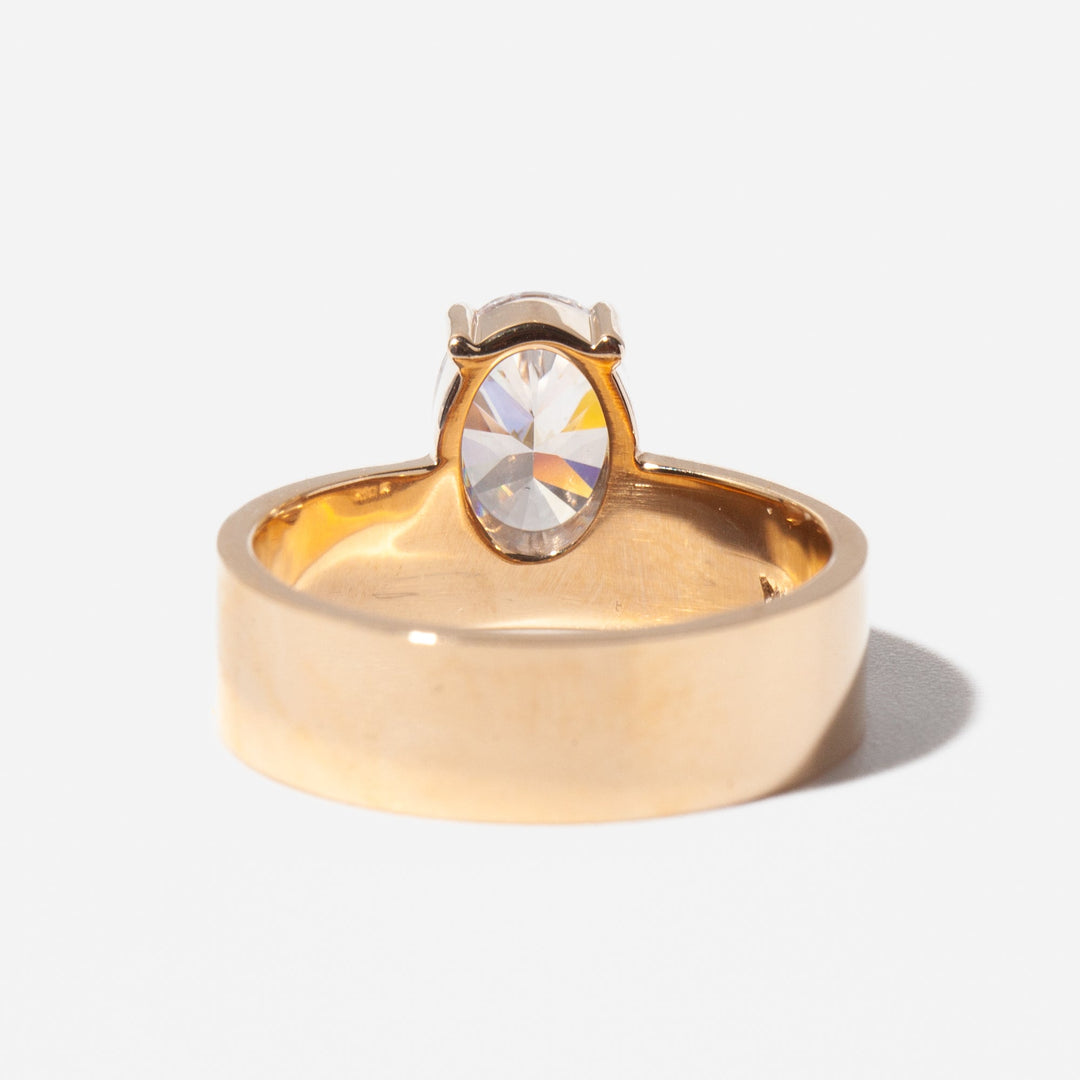 1 carat oval lab diamond monolith engagement ring set in polished gold minimalist modern design