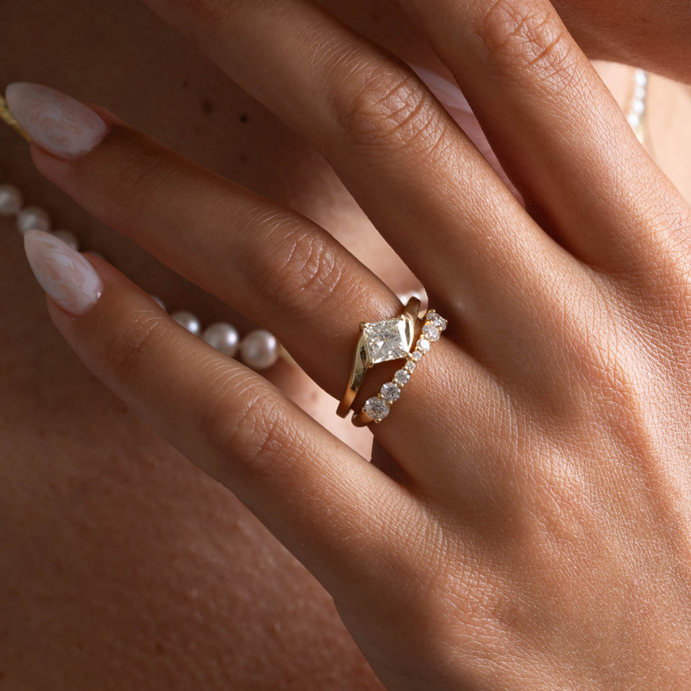 Detailed view of a 1 carat princess cut lab grown diamond solitaire engagement ring highlighting clean minimal design