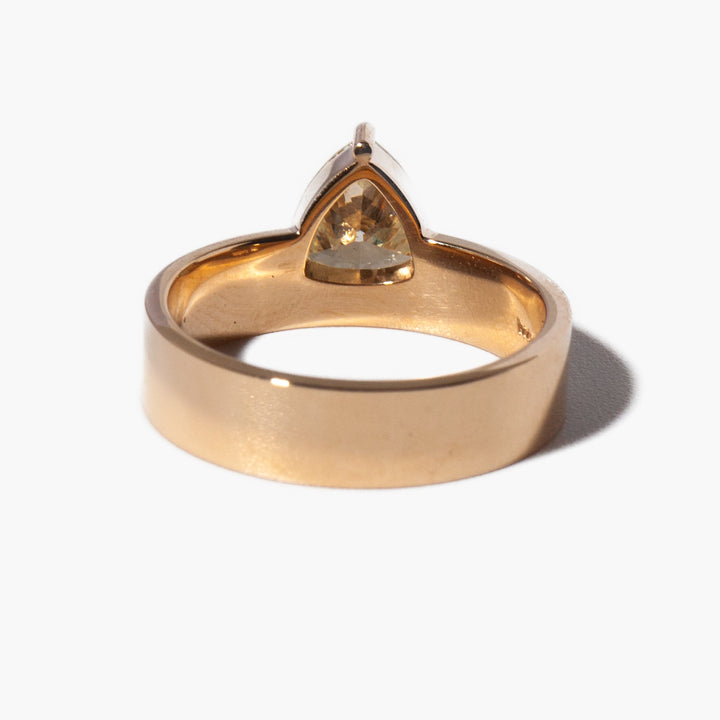1 carat trillion lab diamond monolith engagement ring set in polished gold minimalist modern design