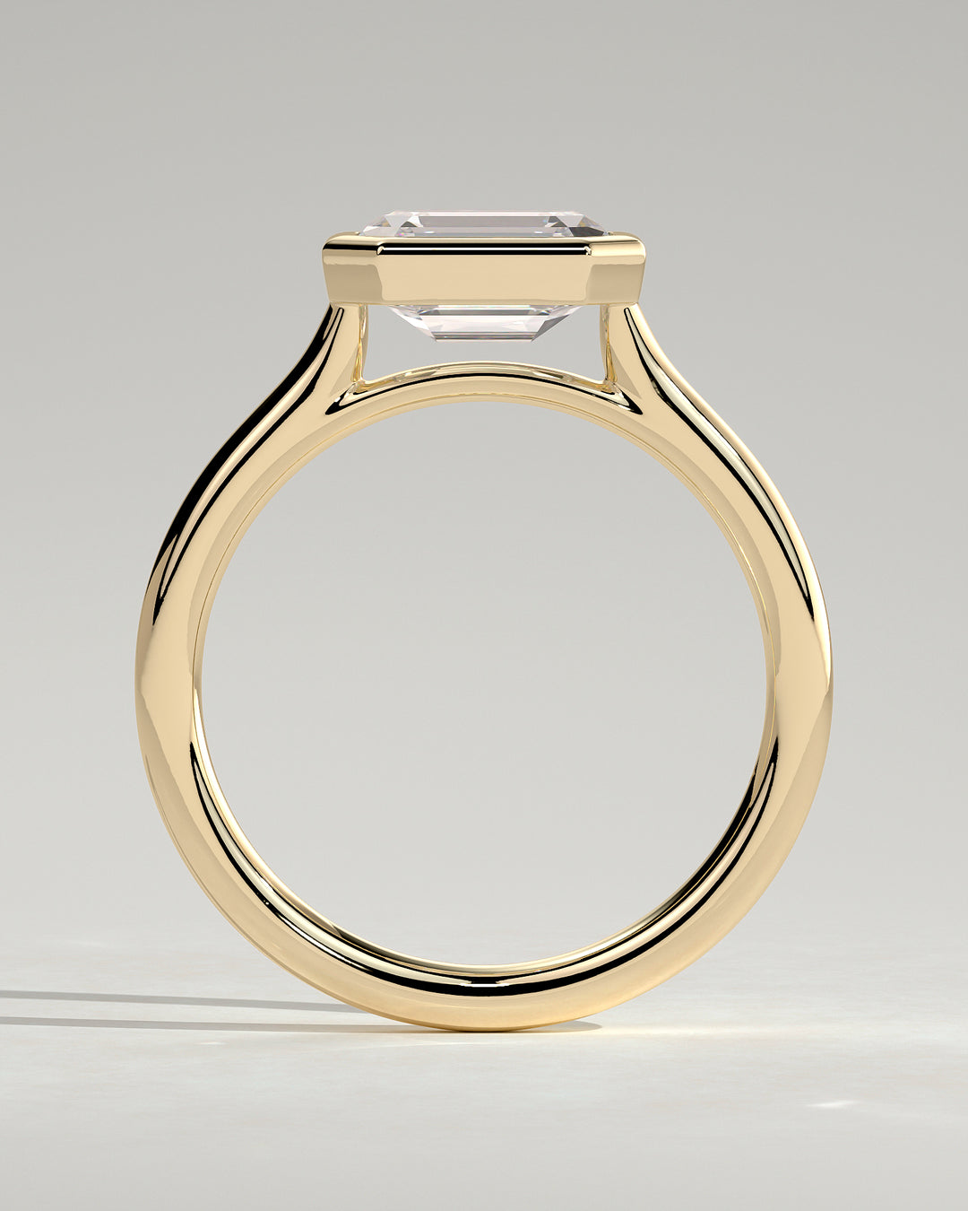 1.5ct East West Emerald Cut E/VS2 Bezel Setting Engagement Ring