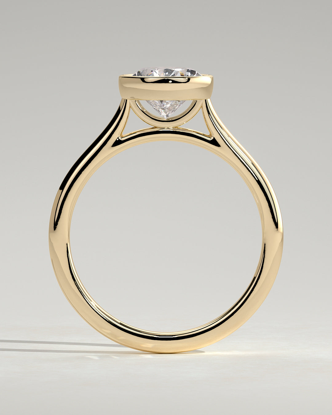 1.5ct Pear Bezel Set Cathedral High Setting Engagement Ring