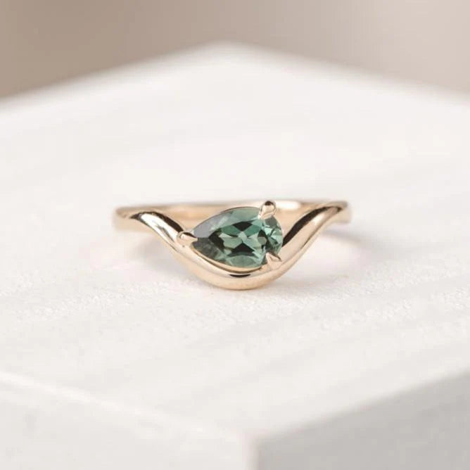 green pear gemstone ring 
