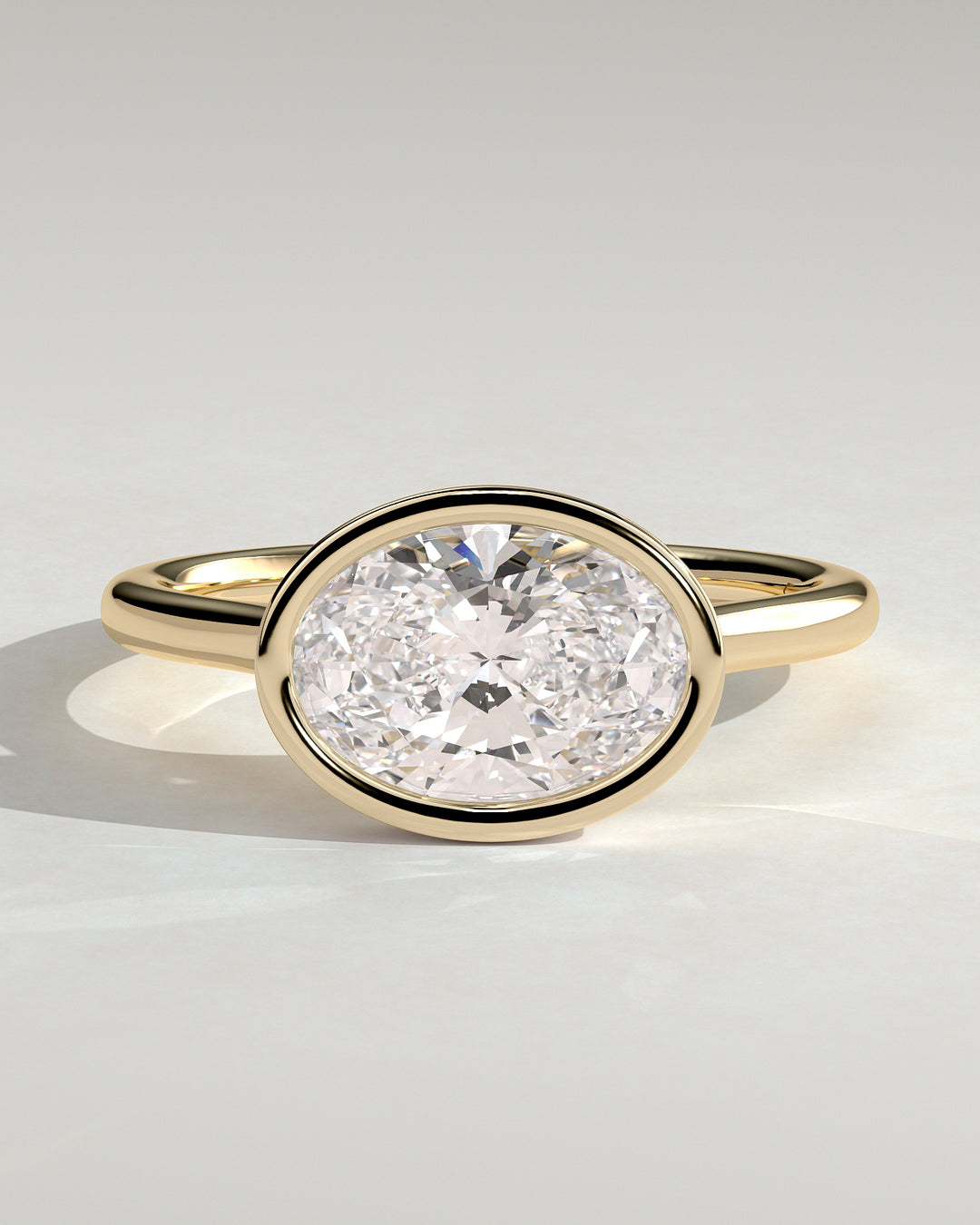 oval bezel engagement ring