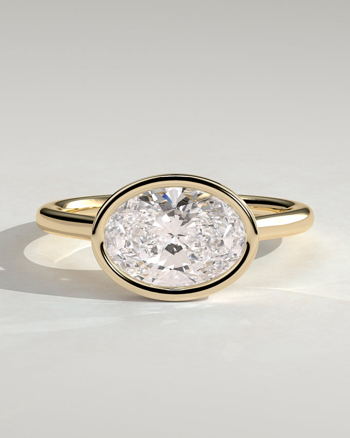 oval bezel engagement ring