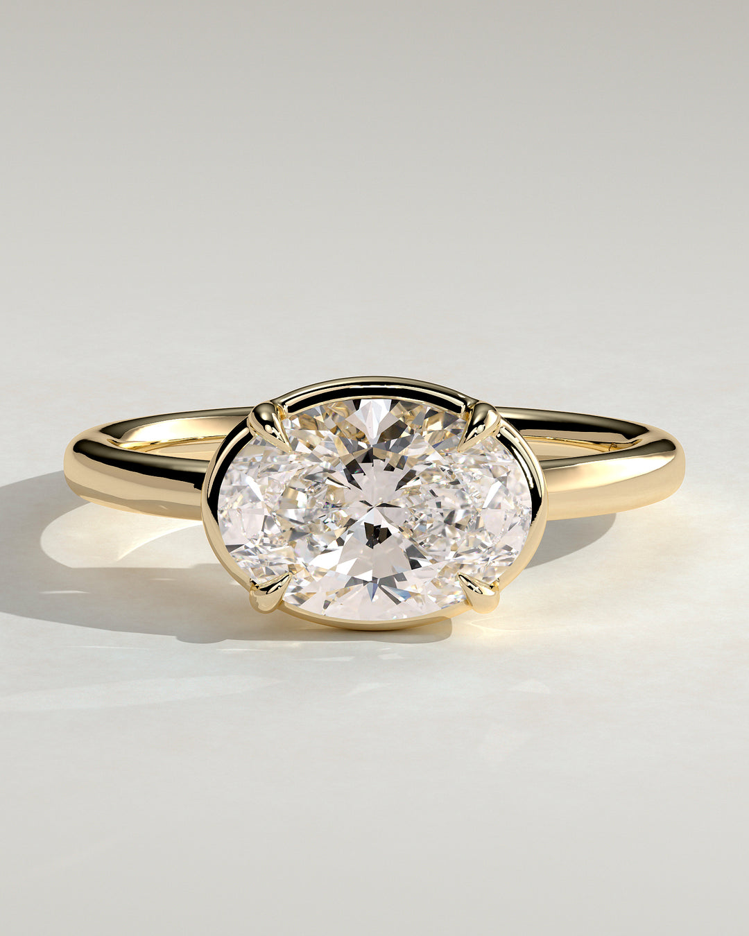 2.0ct East West Oval Solitaire Bezel Frame Engagement Ring