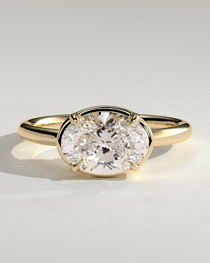 2.0ct East West Oval Solitaire Bezel Frame Engagement Ring