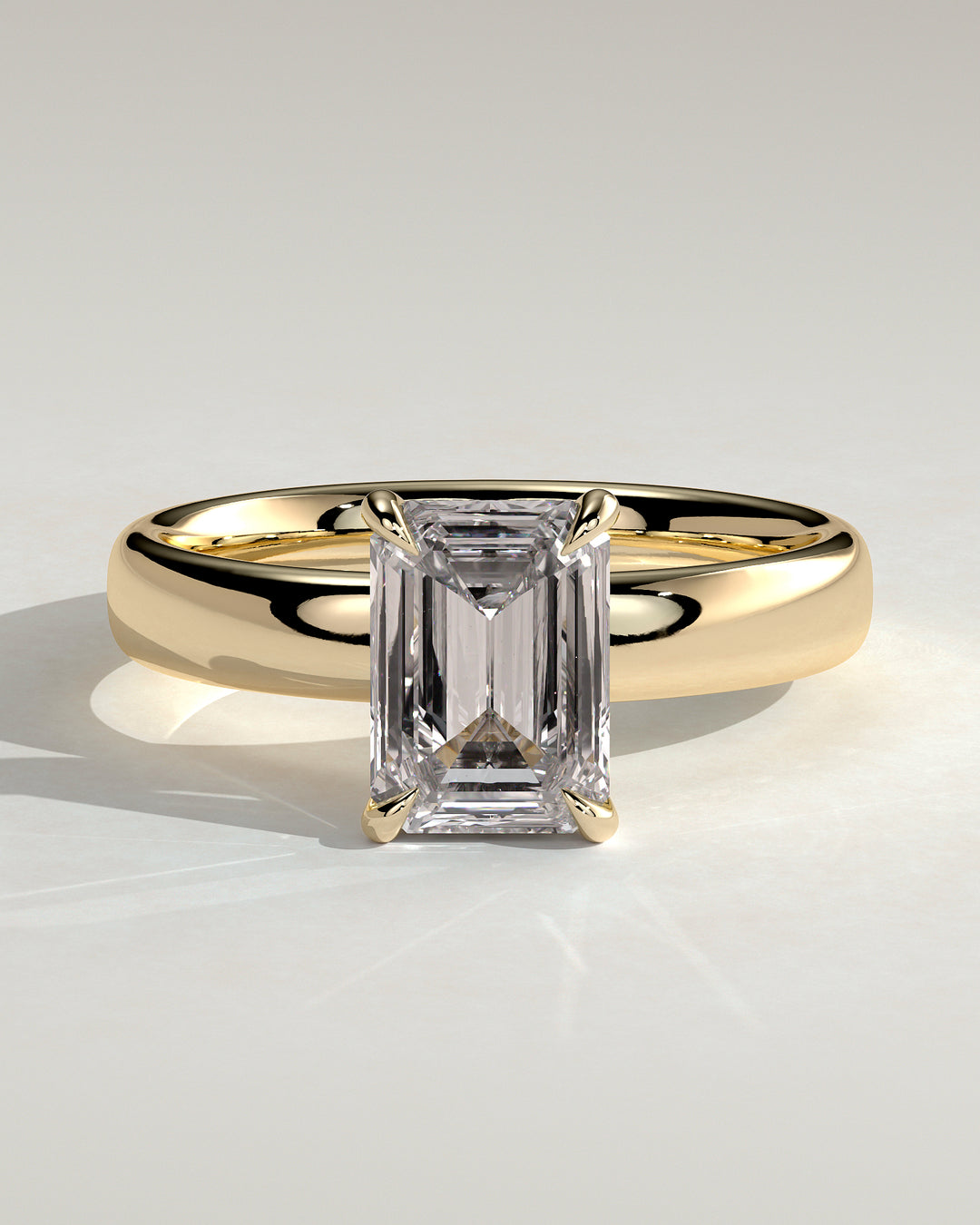 2.0ct Emerald Cut Cigar Band and Hidden Halo Engagement Ring