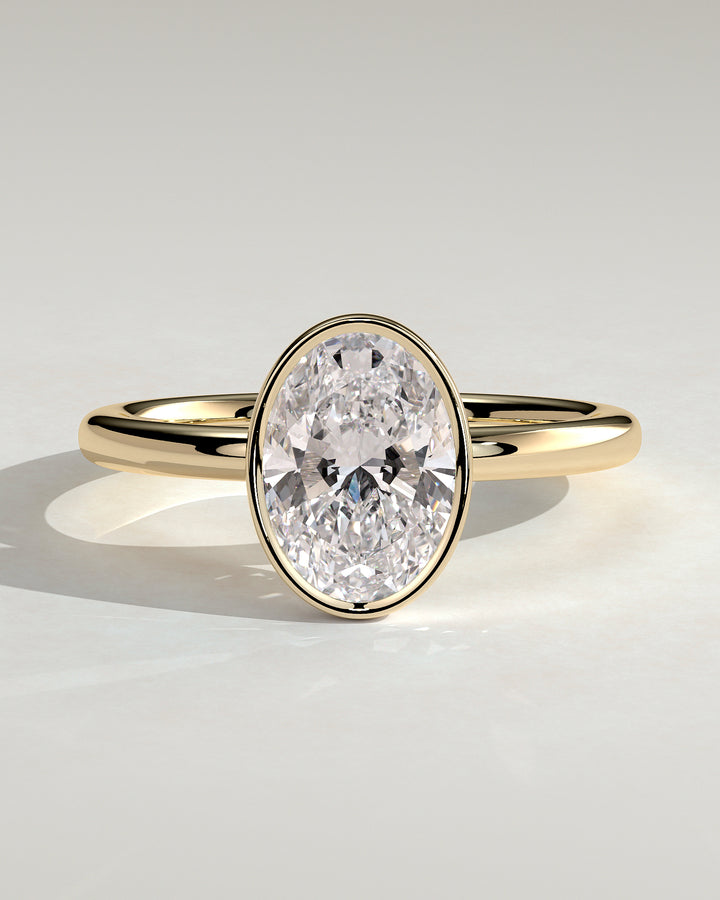 oval bezel engagement ring