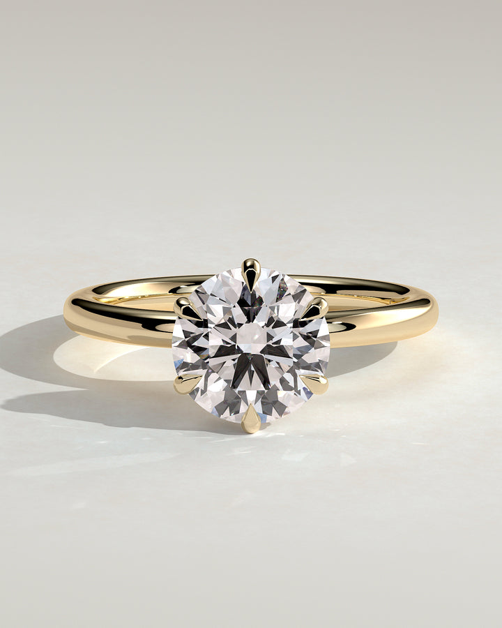 round hidden halo engagement ring