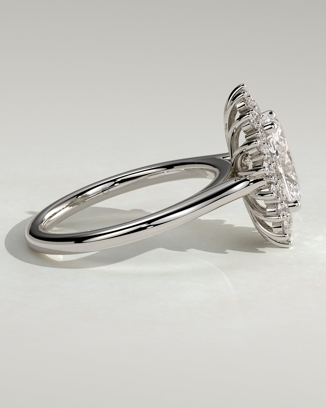 sunburst halo engagement ring