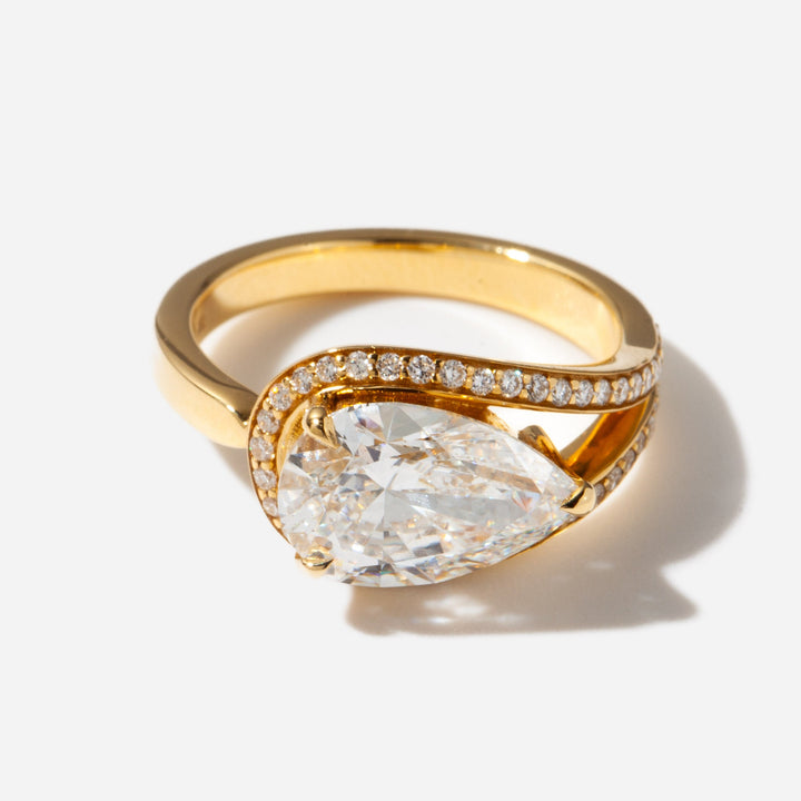 east west pear cut lab diamond engagement ring unique design