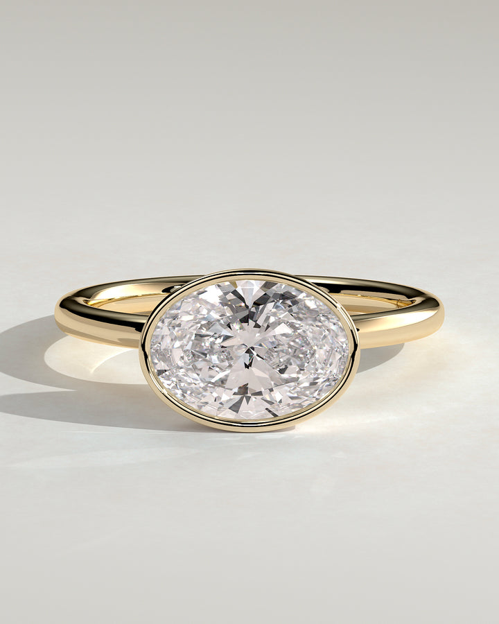 2.5ct East West Oval Bezel Set Solitaire Engagement Ring