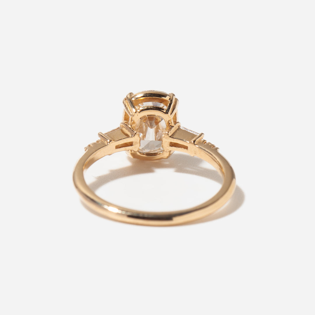 2 carat elongated cushion cut lab diamond engagement ring in gold pavé setting with antique styling elements