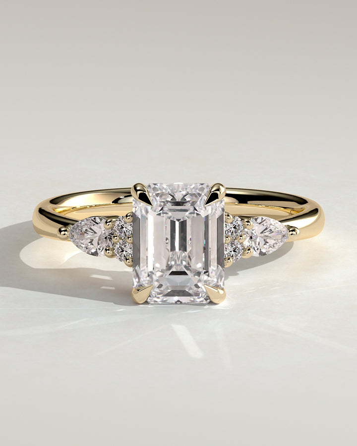 2CT Emerald Solitaire Ring with Pear Accents & Round Shoulder Stones Lab Grown Engagement Ring